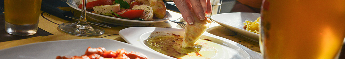 Eating Greek Mediterranean at Mike & Tony's Gyros restaurant in Pittsburgh, PA.